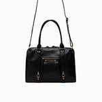 Sac à main Ariana noir vue de face avec la bandoulière