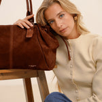 Garance camel tote bag placed on a table