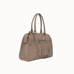Sac à main Noema beige vue de trois-quarts sur fond blanc